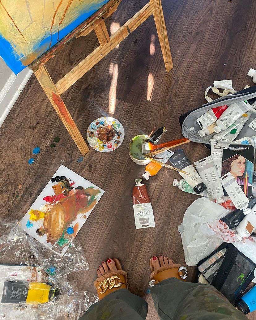Paint palette and materials in the studio